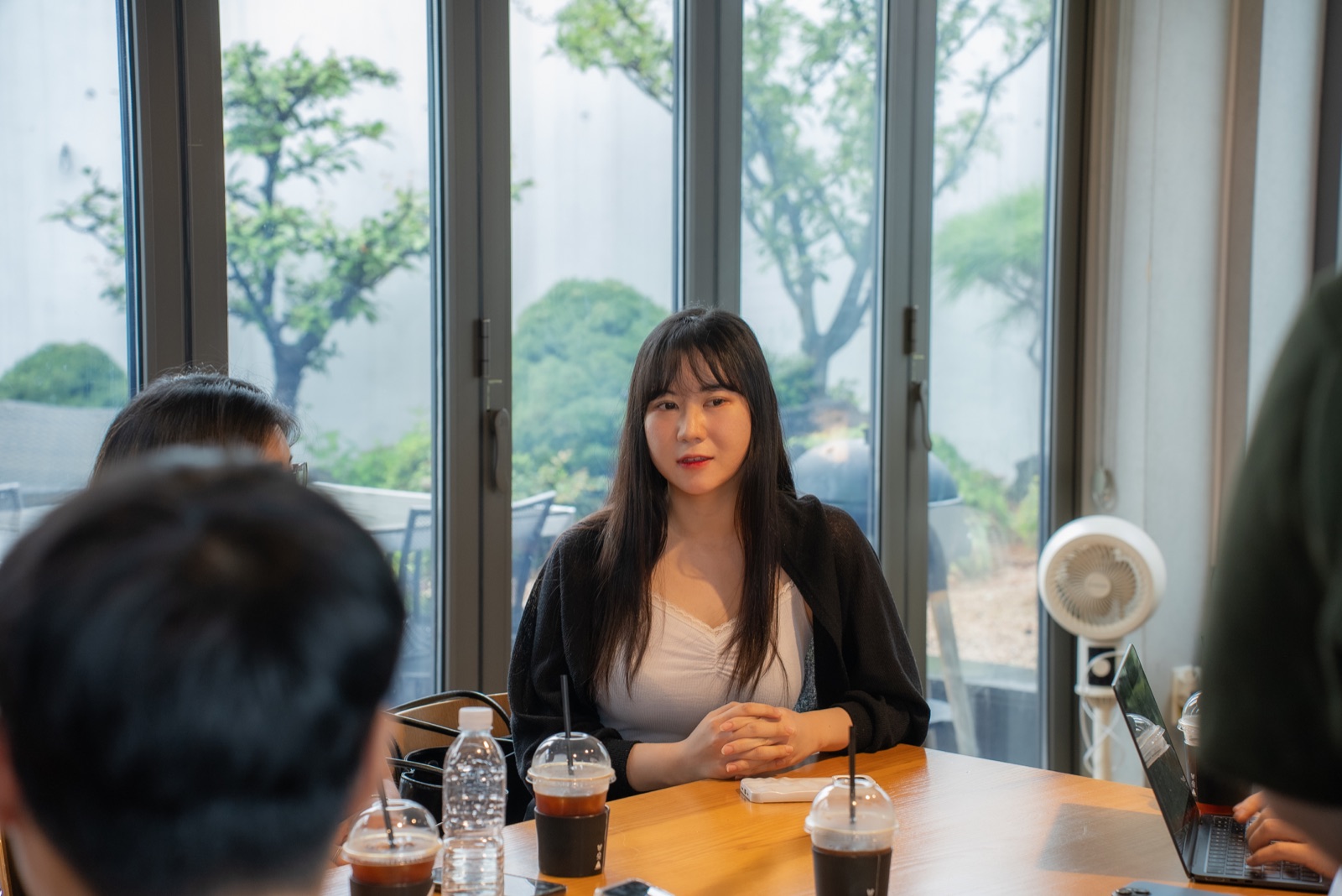A participant listening during a roundtable conversation