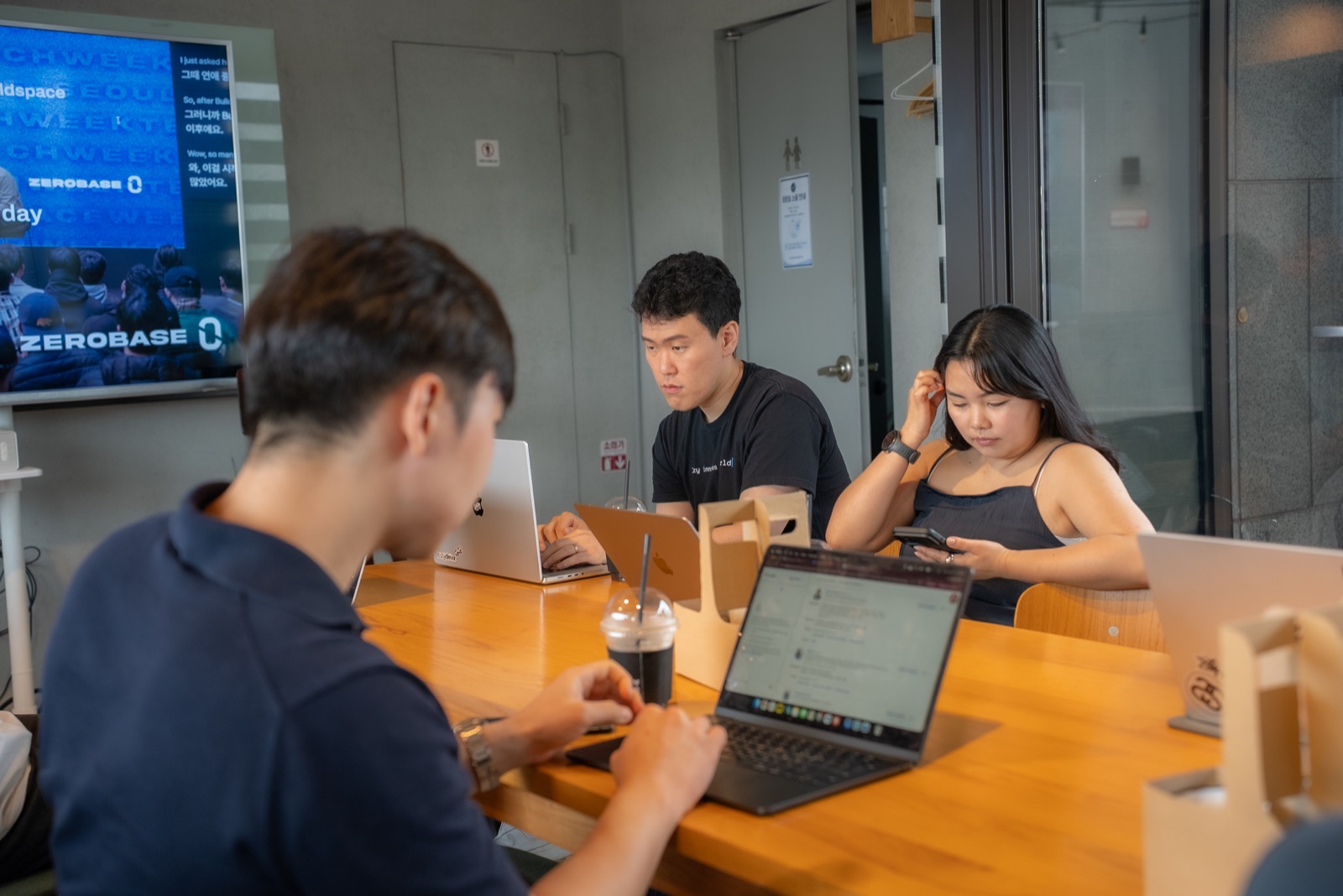 Founders working on their laptops together